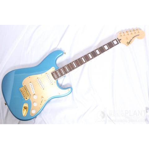 Squier-ストラトキャスター タイプ
40th Anniversary Stratocaster®, Gold Edition, Laurel Fingerboard, Gold Anodized Pickguard, Lake Placid Blue